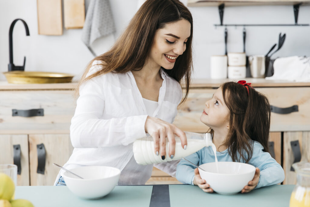 mother daughter having breakfast - Primary Care in Crystal & St. Cloud, MN